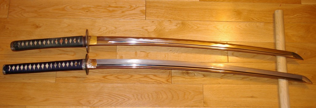 Sword comparison. Alumium alloy iaito on top, carbon steel below.